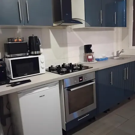 Maison En *