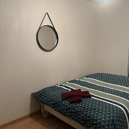 Maison En